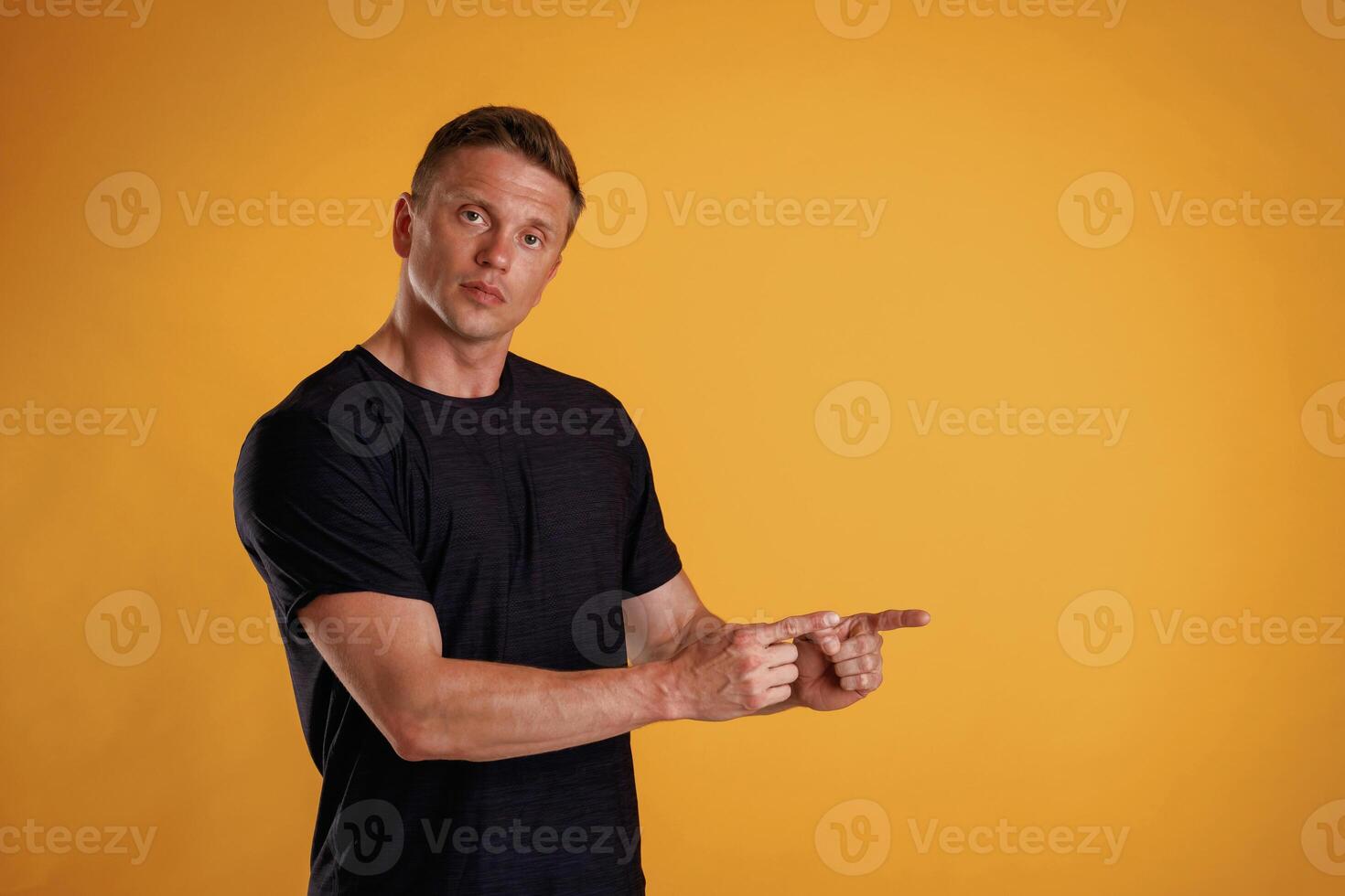 Copy space, concept, showing, pointing.,, Man is against background in the studio photo
