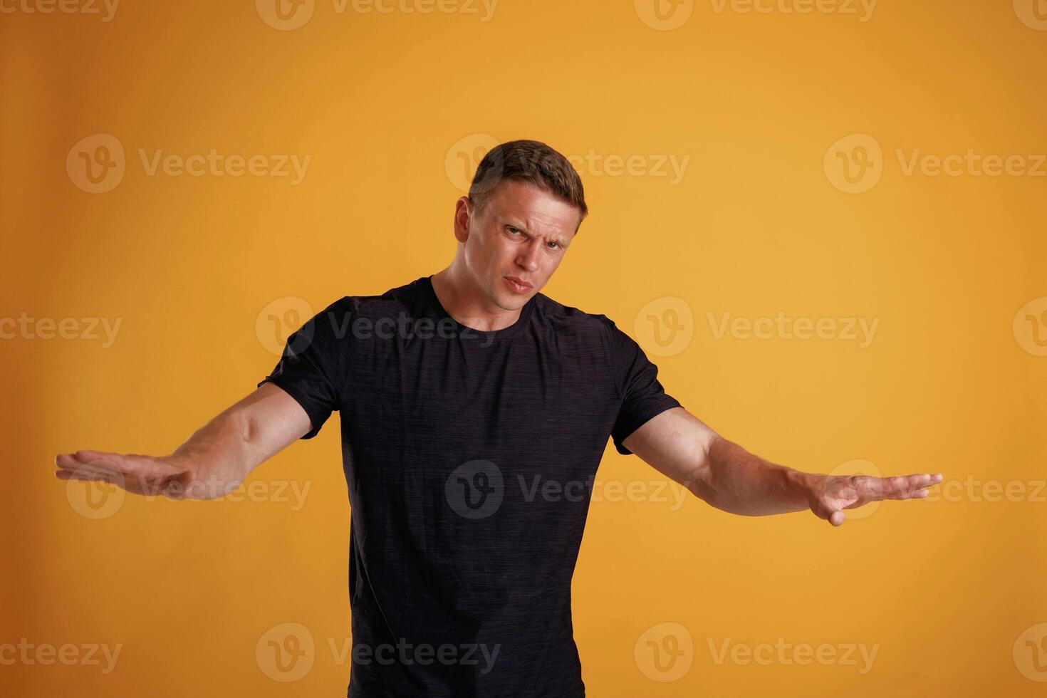 Pushing off the copy space. Man is against background in the studio photo