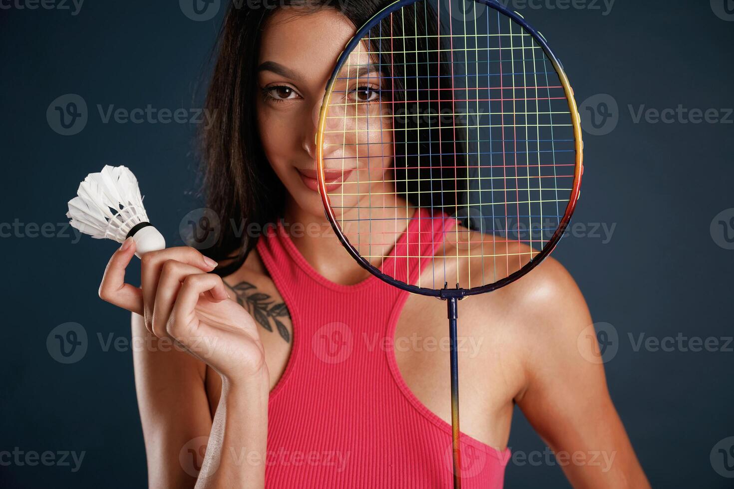 Hobby conception,,, badminto,n player. Beautiful young woman is against background photo