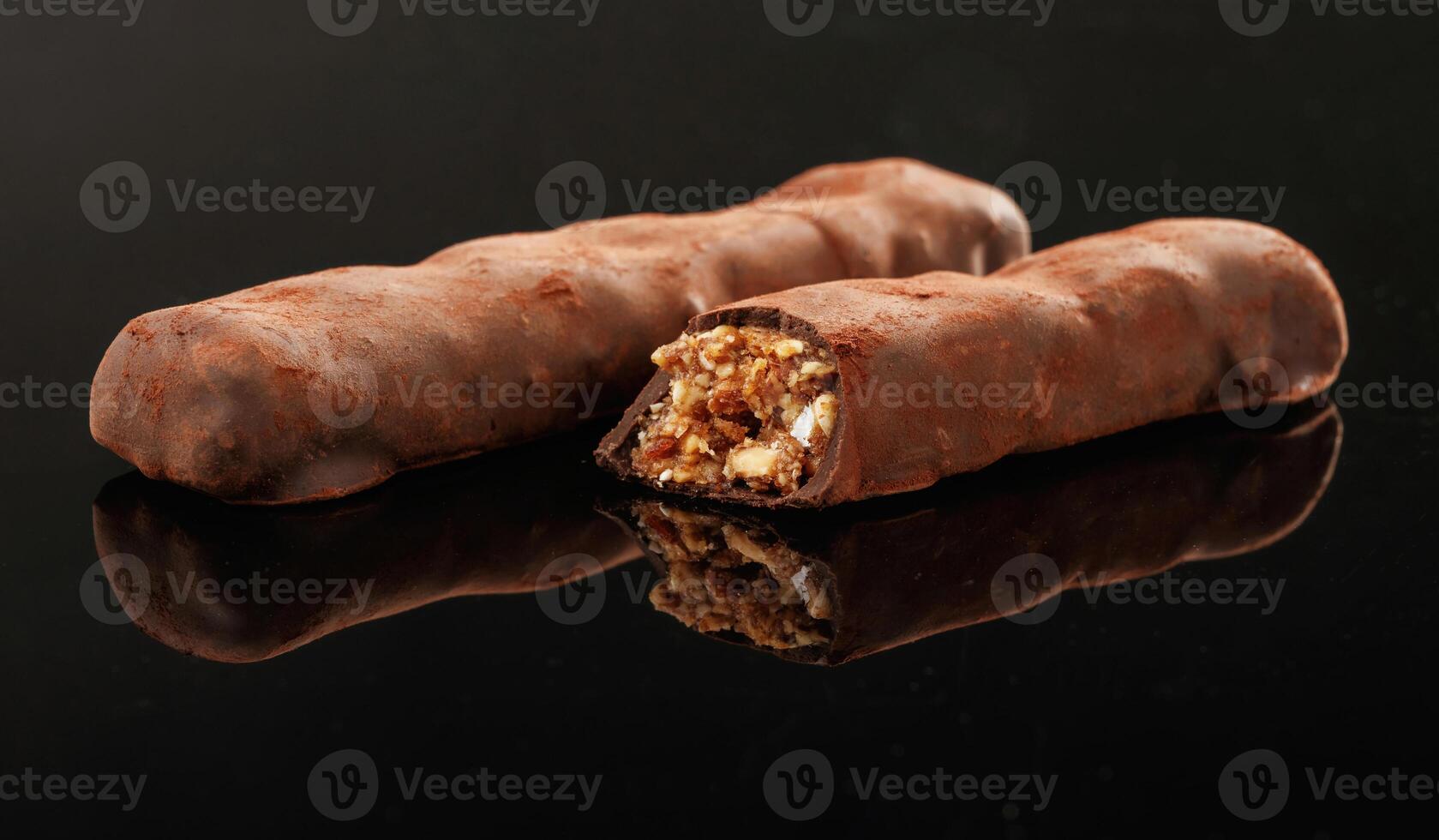 Close up ,view... Crispy and sweet chocolate bars on black background photo