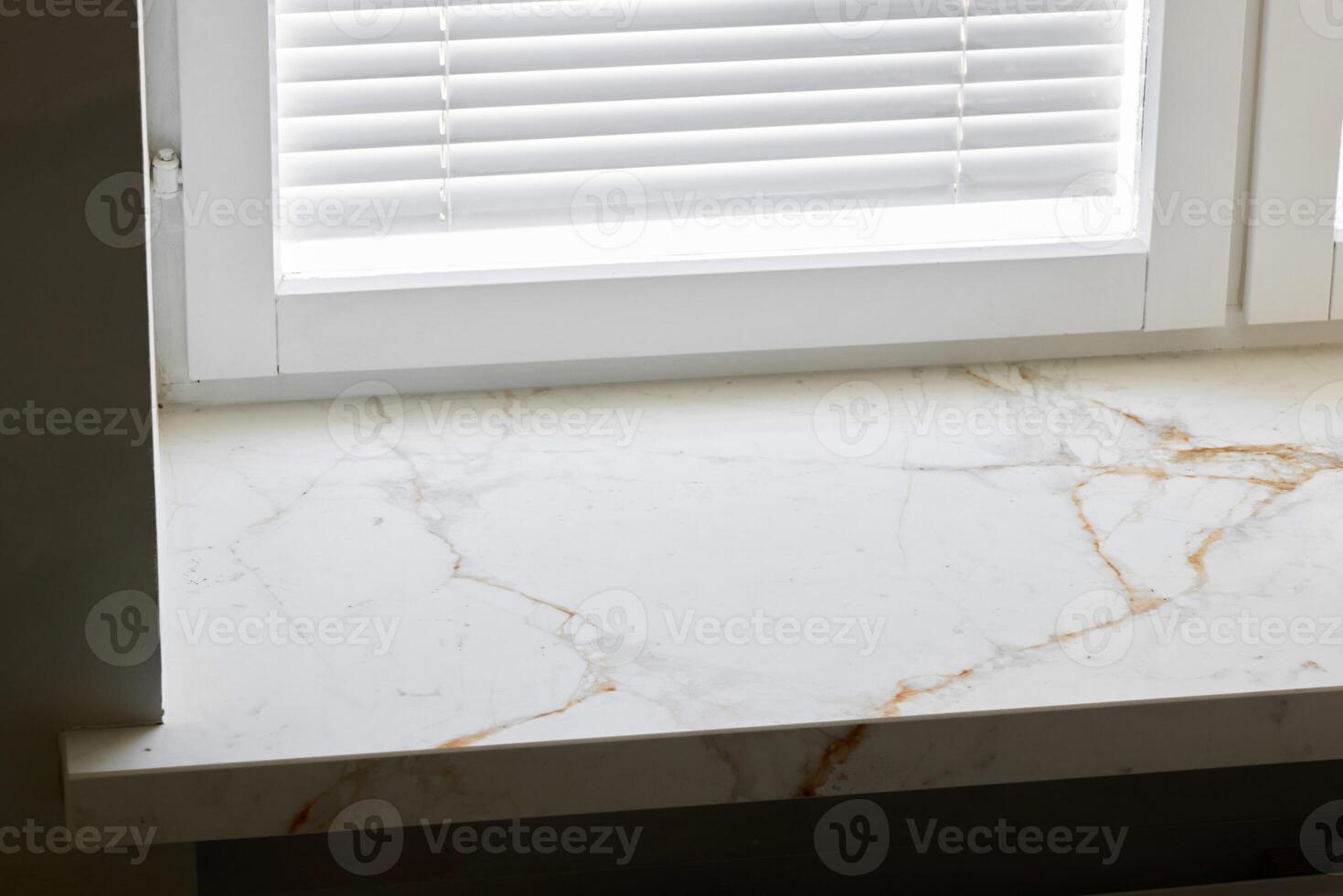 This Elegant Marble Window Sill features Natural Patterns that enhance its appeal photo