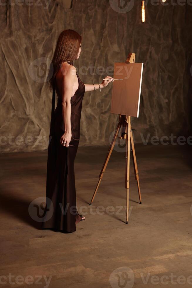 An Elegant Artist Creating Art on a Canvas in a Beautiful Studio Setting with Inspiration and Style photo