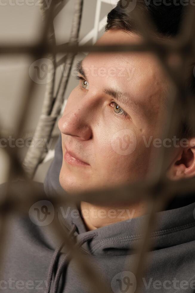 Introspective Portrait Capturing a Moment of Deep Reflection and Personal Contemplation photo