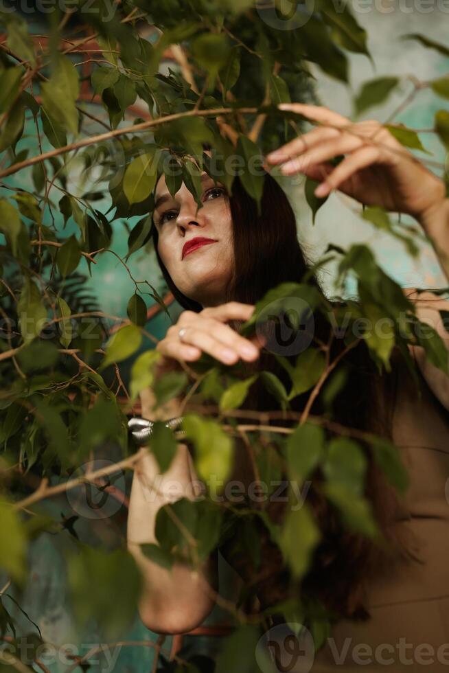 A Mystifying Woman Engaging with Nature in a Beautiful and Serene Setting of Enchantment photo
