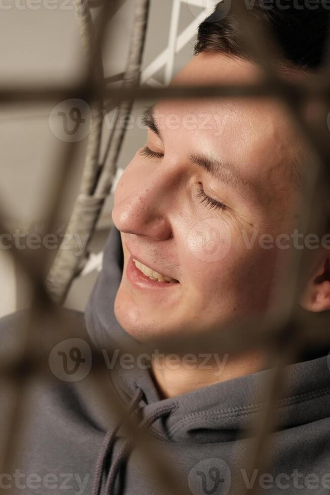 A Relaxed Individual Enjoying a Cozy and Comfortable Setup While Embracing Inner Peace photo