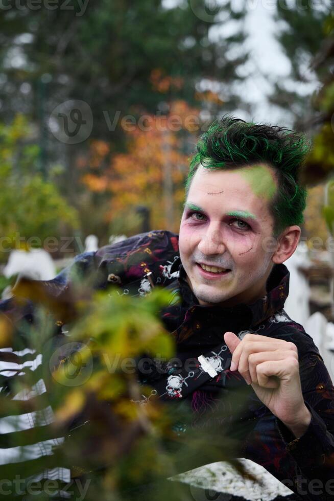 A Creative Model sporting Green Hair is captured in a Scenic Outdoor Setting full of beauty photo