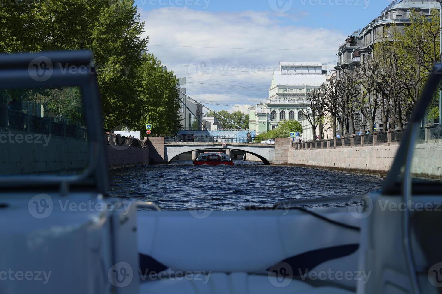 Enjoy scenic canal views on a delightful boat ride through the captivating urban landscape photo