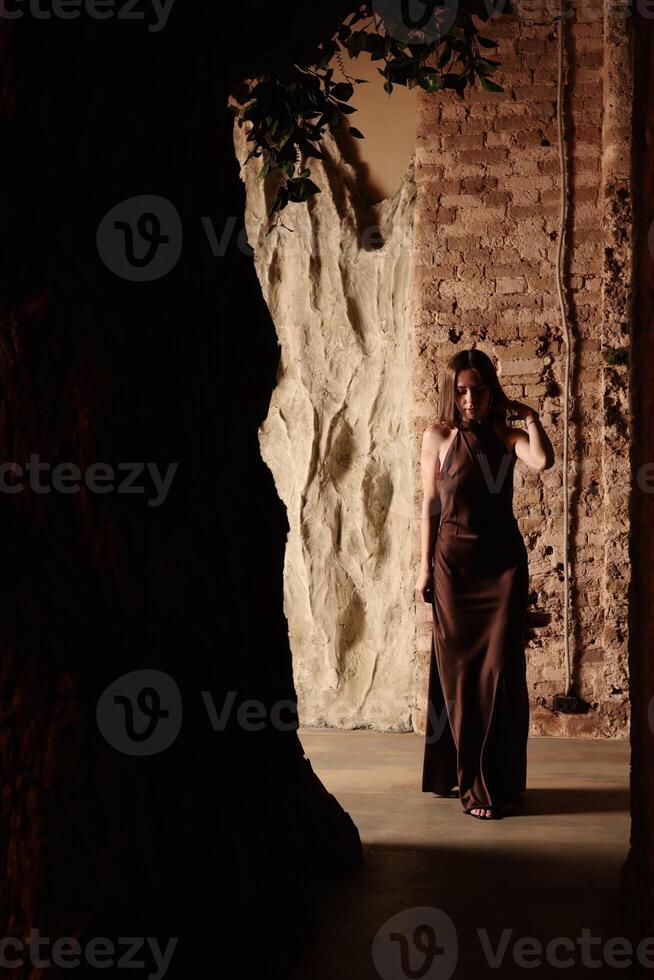 An Elegant Woman Gracefully Posing in a Captivating and Artistic Setting with Style photo