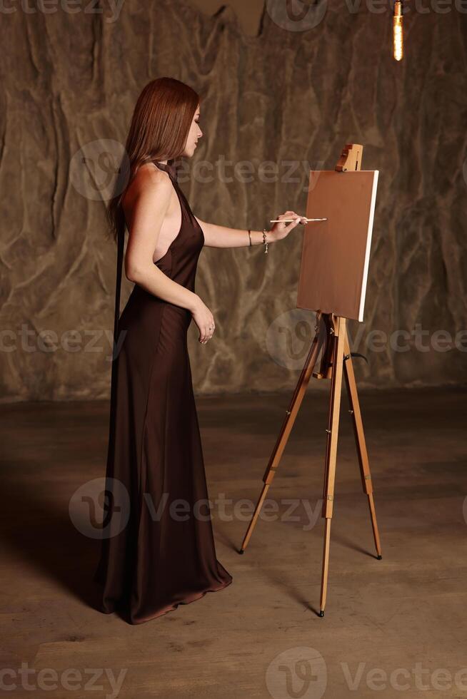 The Artistic Process of a Female Artist Expressing Her Creativity in a Creative Space with Passion photo