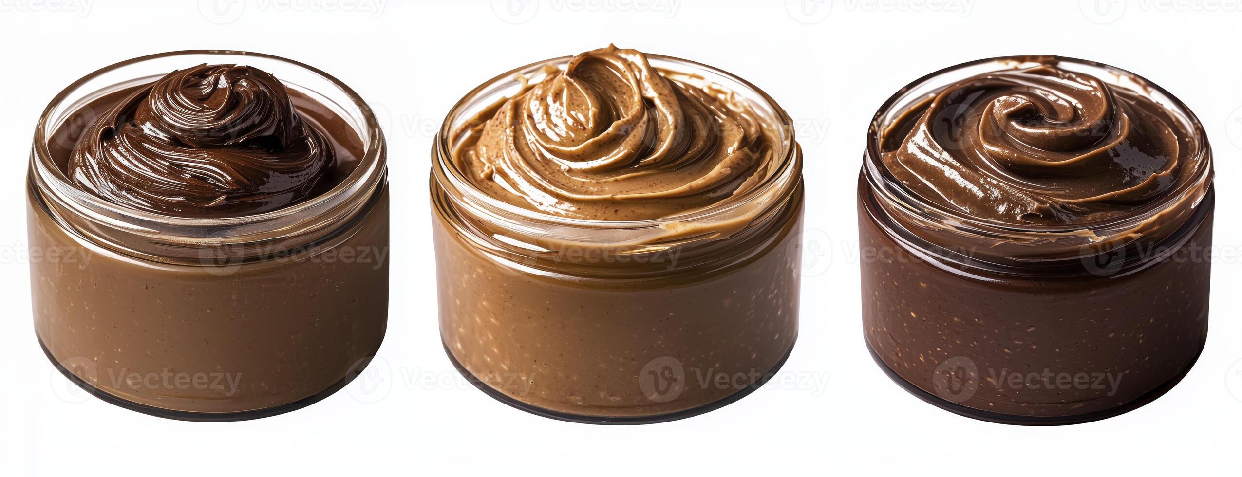 Glass jars of nut and chocolate hazelnut spread isolated on white background photo