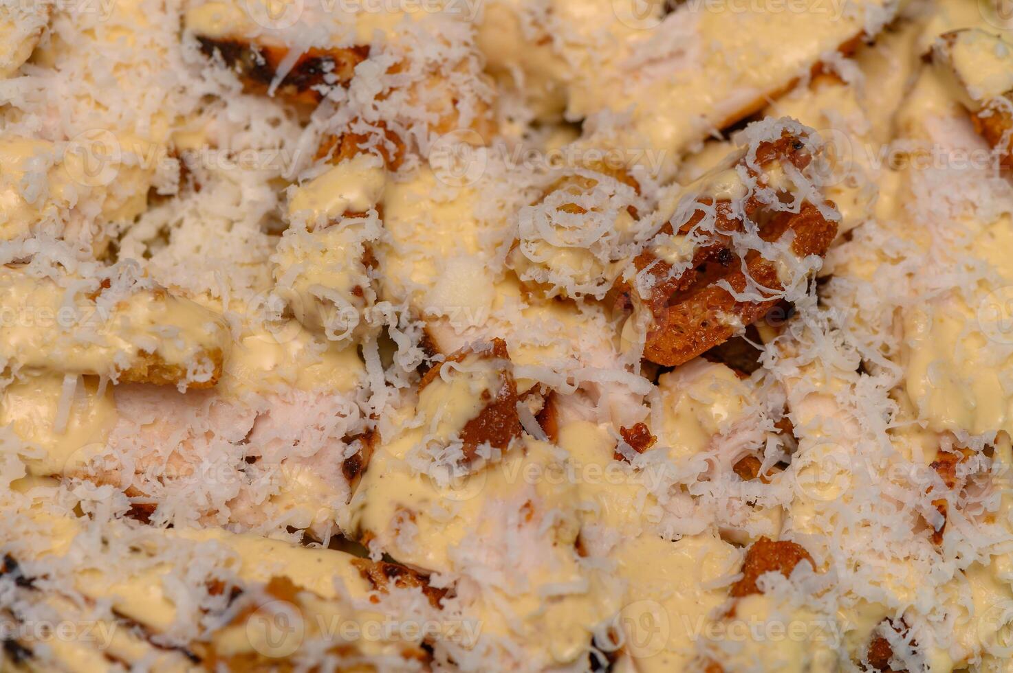 Caesar Salad Close-Up with Croutons and Parmesan photo