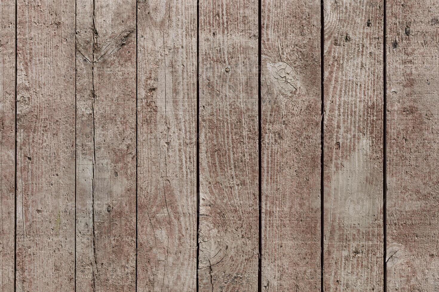 A collection of weathered wooden planks showcases a rustic texture and natural aging. These planks are ideal for home decor, craft projects, and design inspirations at any time photo