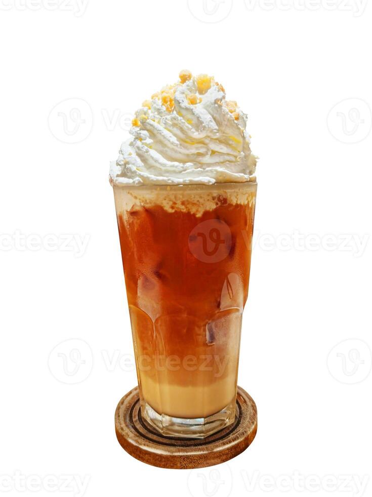 Thai Tea Milkshake topped with whipped cream isolated on white background. photo