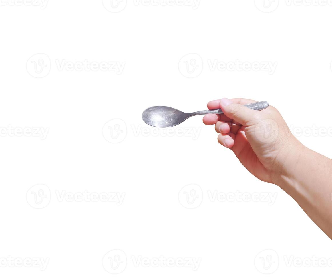 Empty spoon in man's hand, isolated on white background. photo