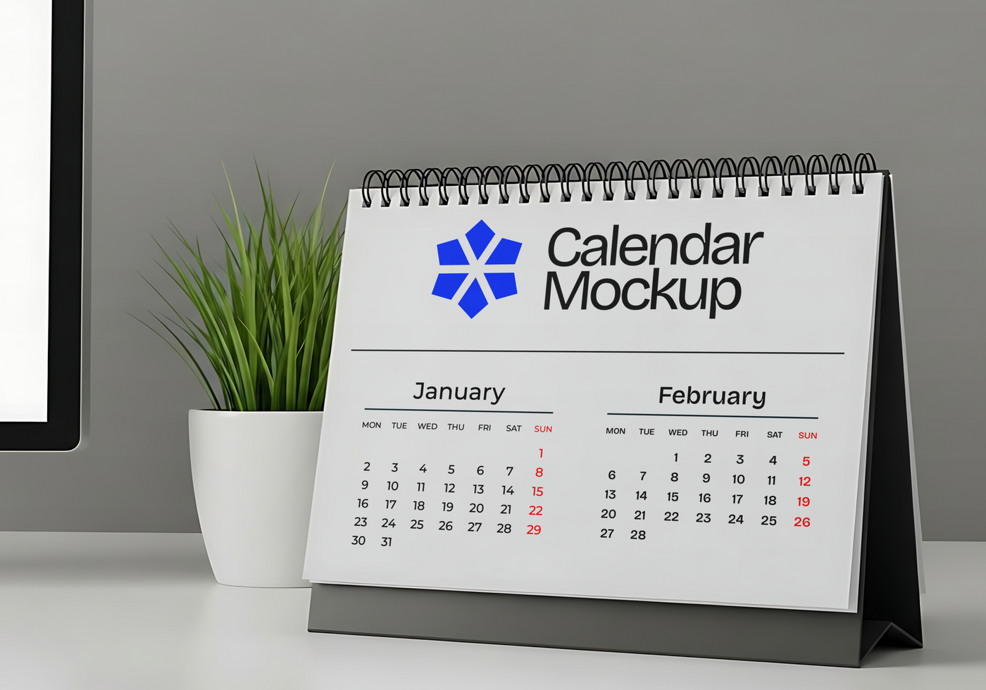 Calendar Mockup on a White Desk psd