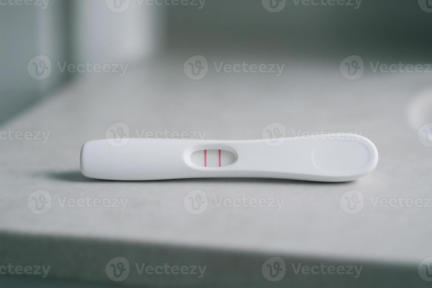 Positive pregnancy test on bathroom counter, concept of fertility, family planning, early pregnancy confirmation with copy space photo