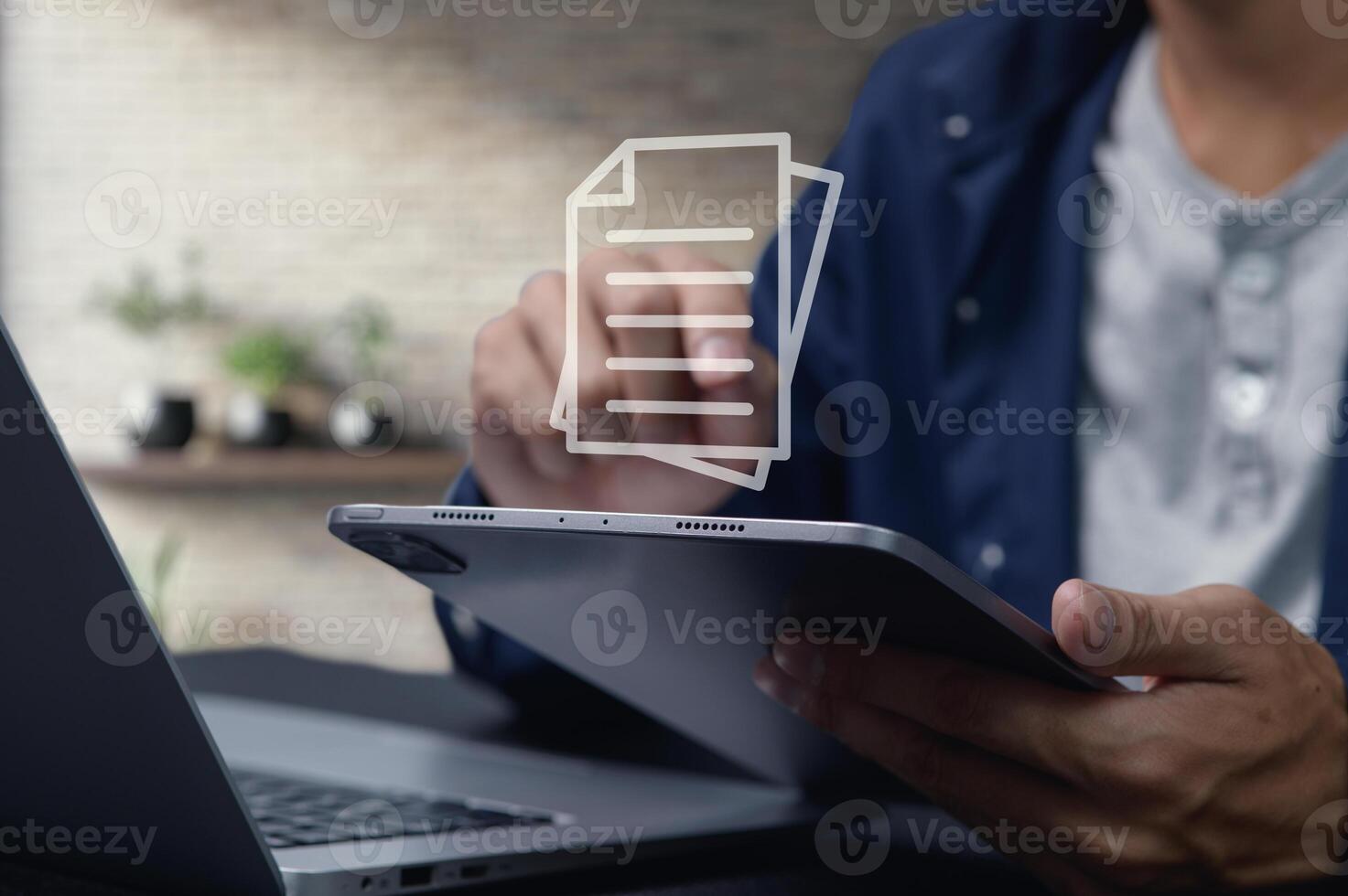 Individuals Transitioning to Digital Documents for Enhanced Efficiency photo