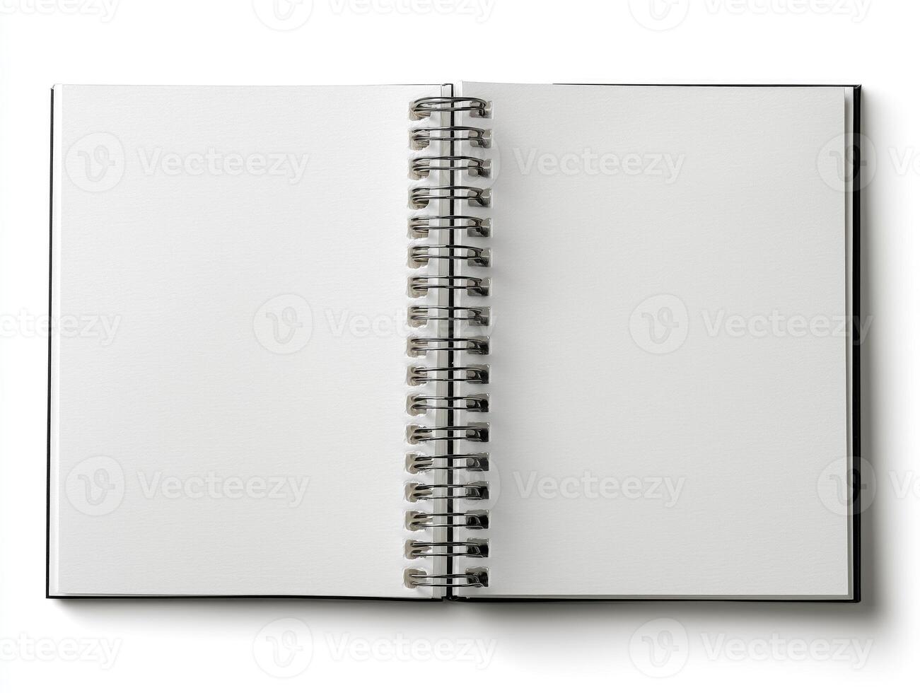 Open blank spiral notebook on white background, top view. photo