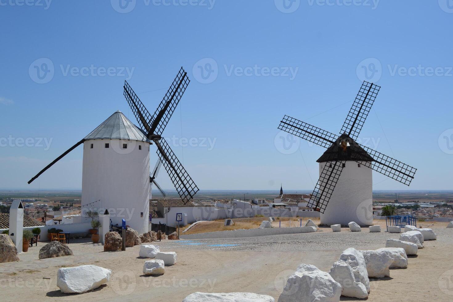 Spanish windmills in la mancha on a clear day - cultural landmark and scenic view. Campo de Criptana. La Mancha. Spain photo
