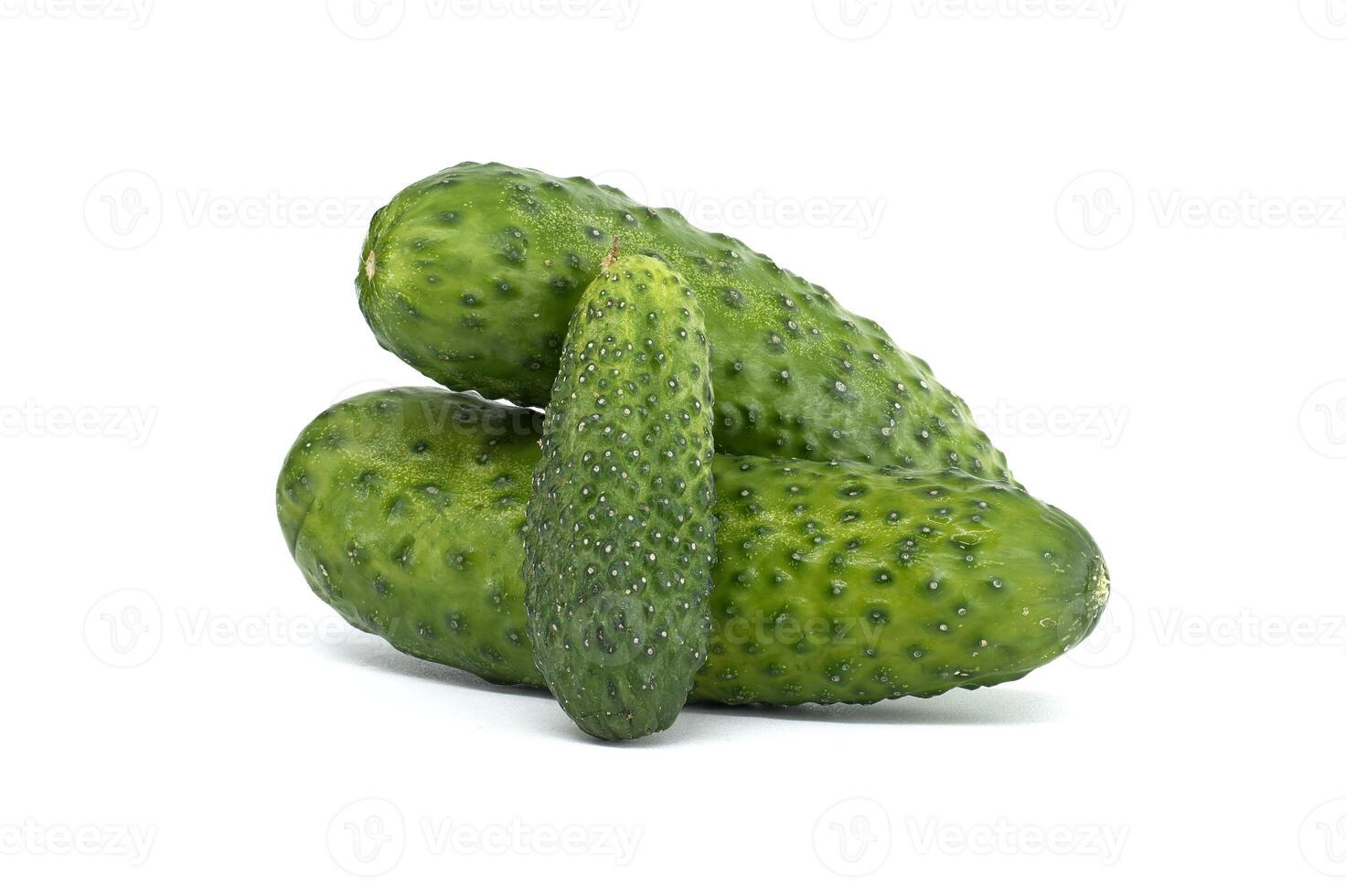 Fresh Green Cucumbers Isolated on White Background in Close-Up View photo