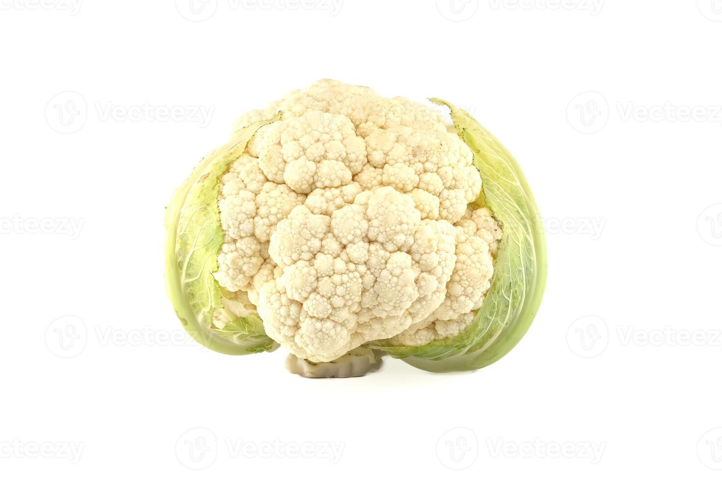 A pristine cauliflower head rests against a bright, plain white backdrop, isolated for use. photo