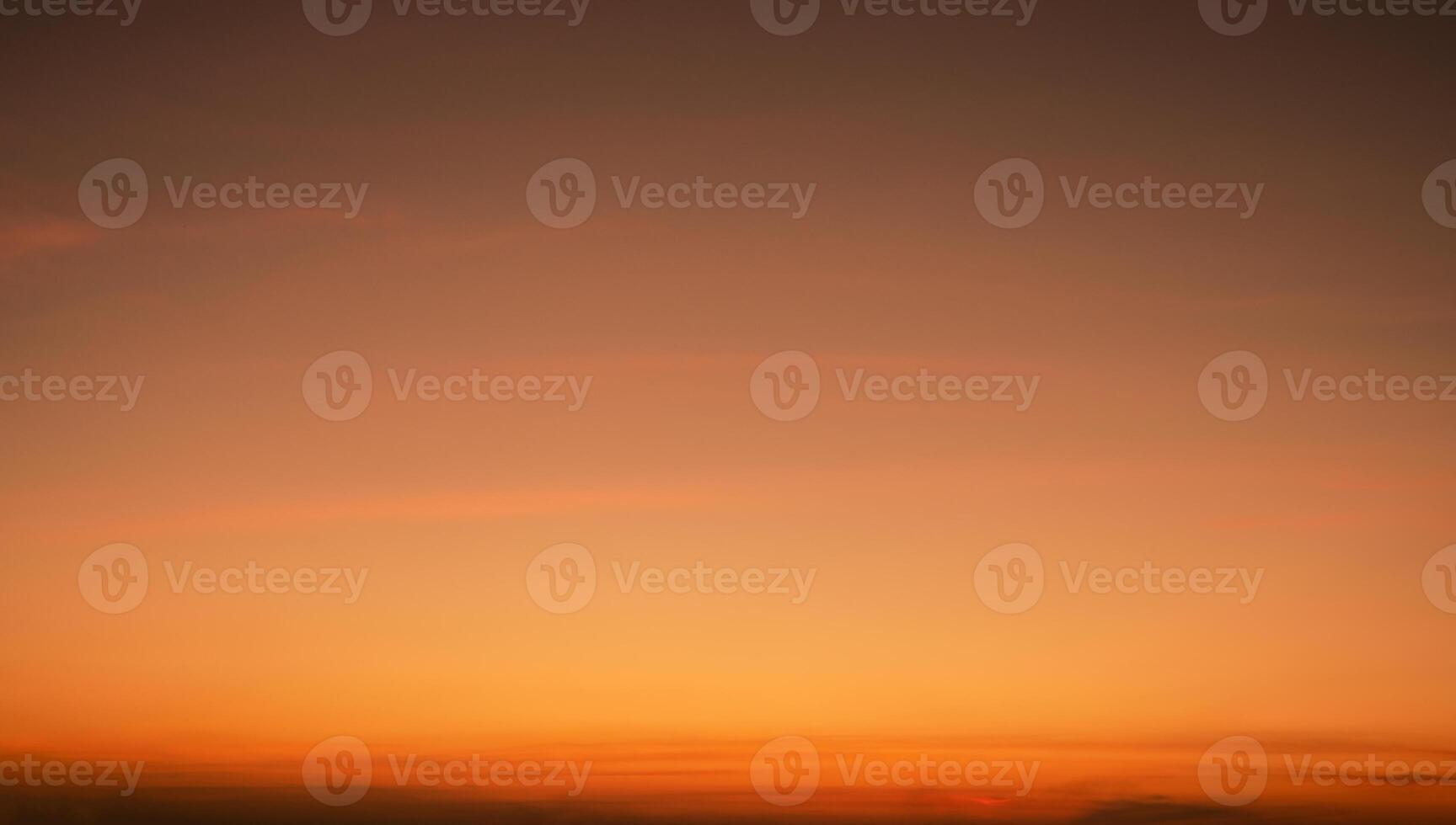 Calming orange sunset glows above peaceful horizon in summer. Peaceful sky at dusk create serene atmosphere for relaxation meditation background nature landscape scenic view summer evening tranquility photo