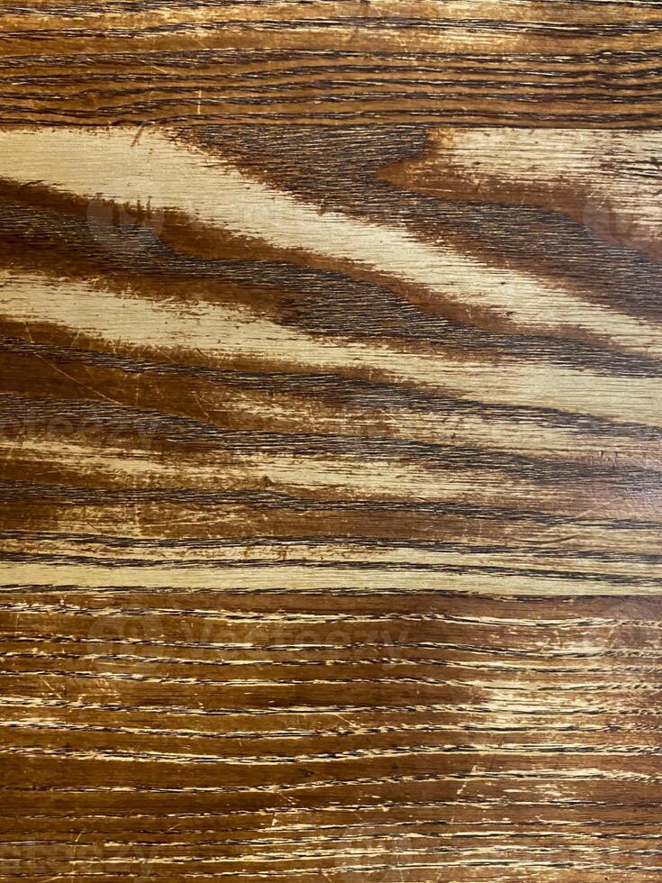 Old rustic wooden background with natural texture, weathered surface ideal for design or vintage themes photo