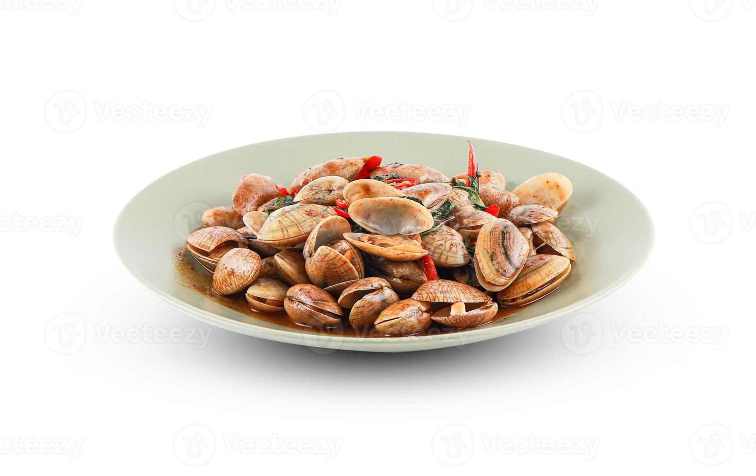 Stir-fried Clams with Chilli Paste isolated on white background with clipping path. Stir fried striped clams with basil, chilli paste, garlic and fresh chilies, thai seafood. photo