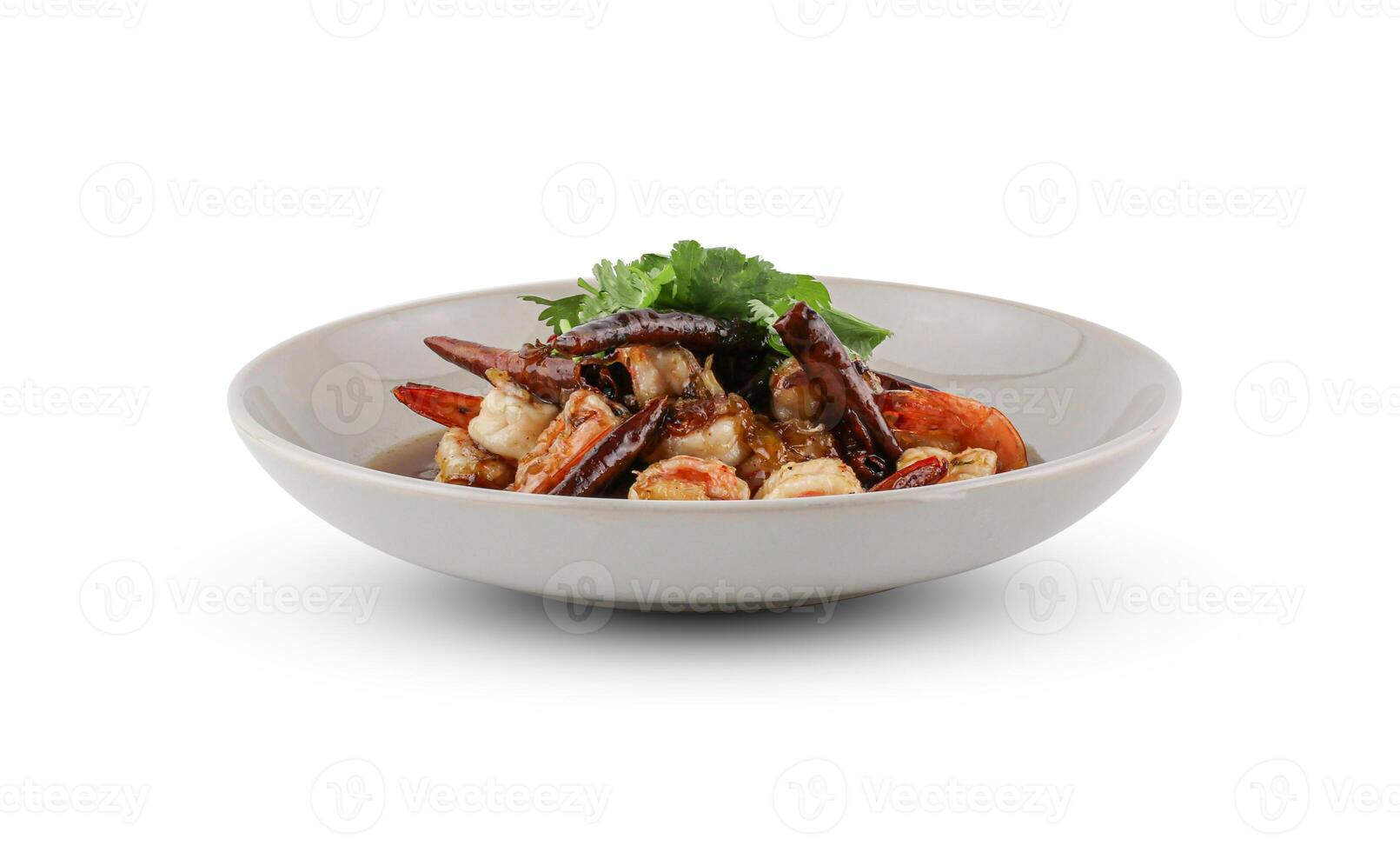 Crispy Prawn in Tamarind Glaze Sprinkle with dried chili isolated on the white background with clipping path, Fried Prawn with Tamarind Sauce, Thai food. photo