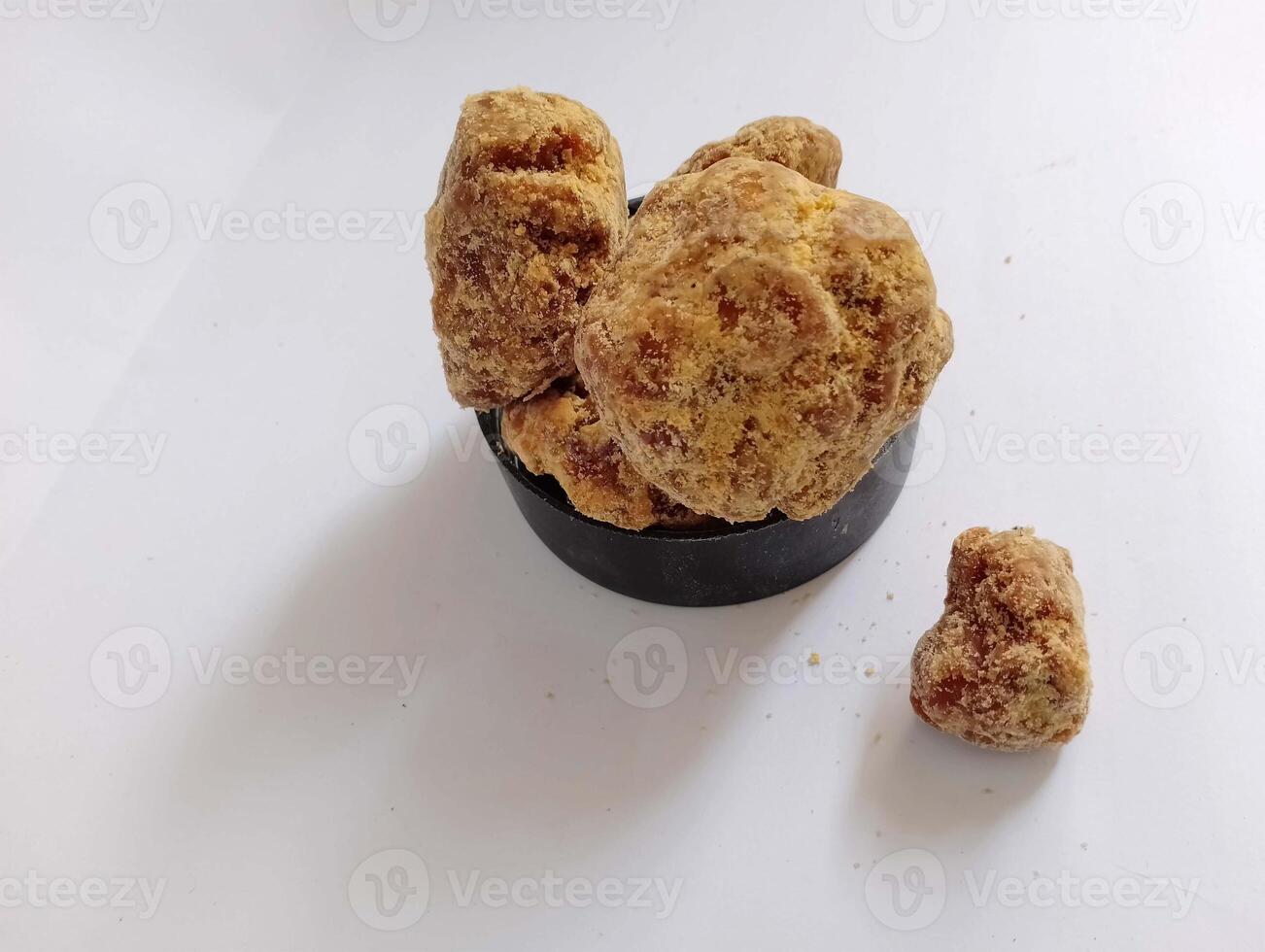 Pure organic Gur made from fresh sugarcane syrup. photo