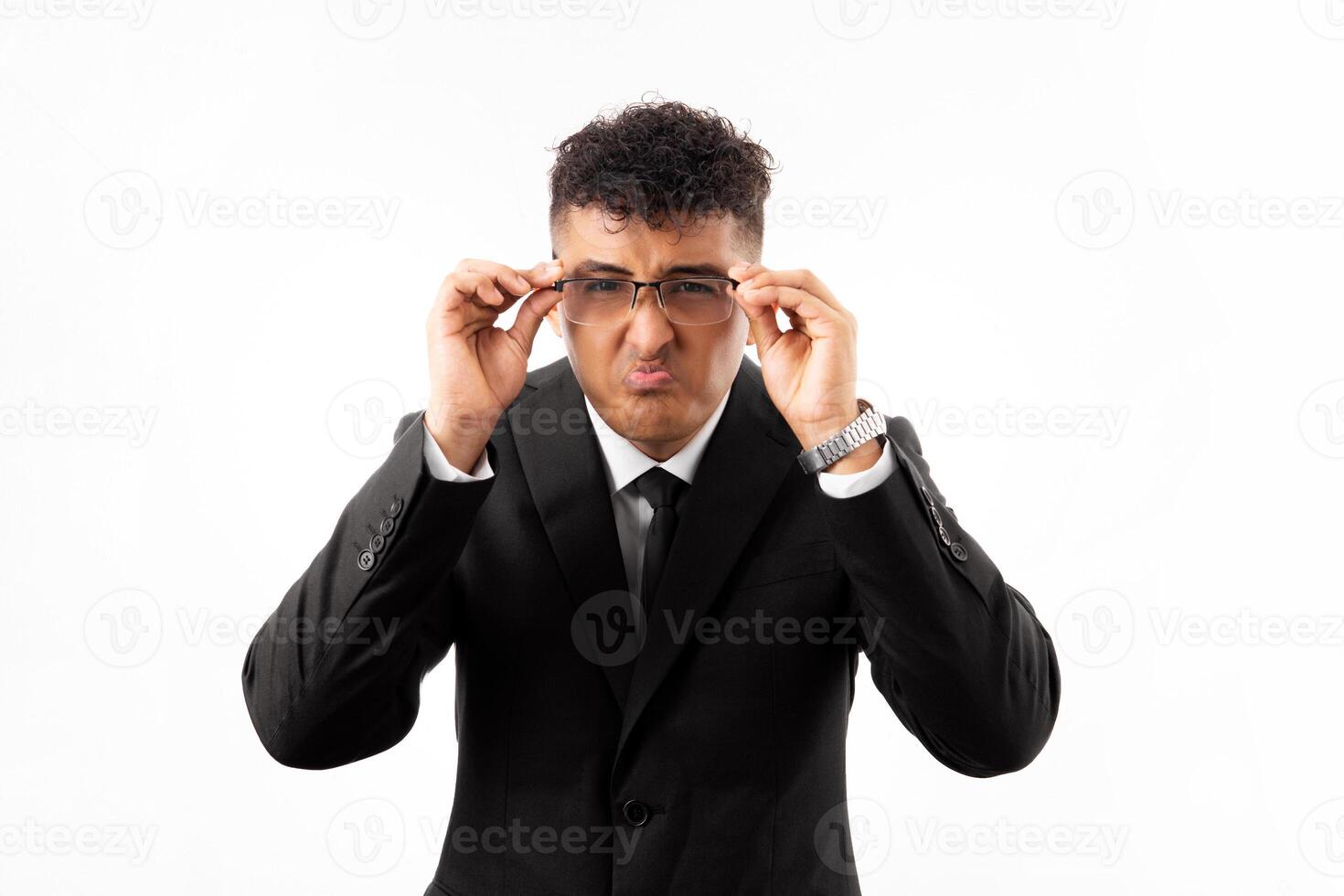 Young hispanic man standing over white background rubbing eyes for fatigue and headache, sleepy and tired expression. vision problem photo