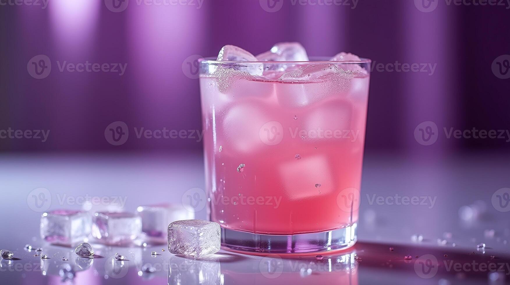 An elegant libation in a glass with ice, illuminated by a soft glow. photo