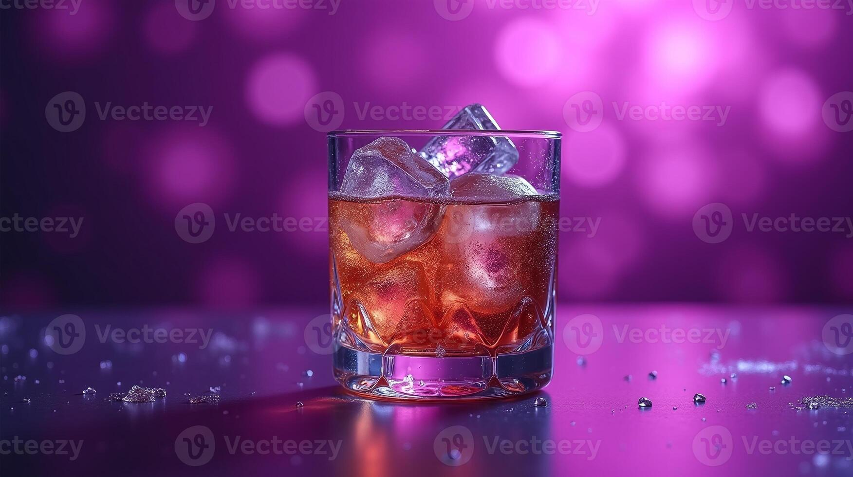 A glass of cold, refreshing liquid with ice cubes against a vibrant, blurred background. photo