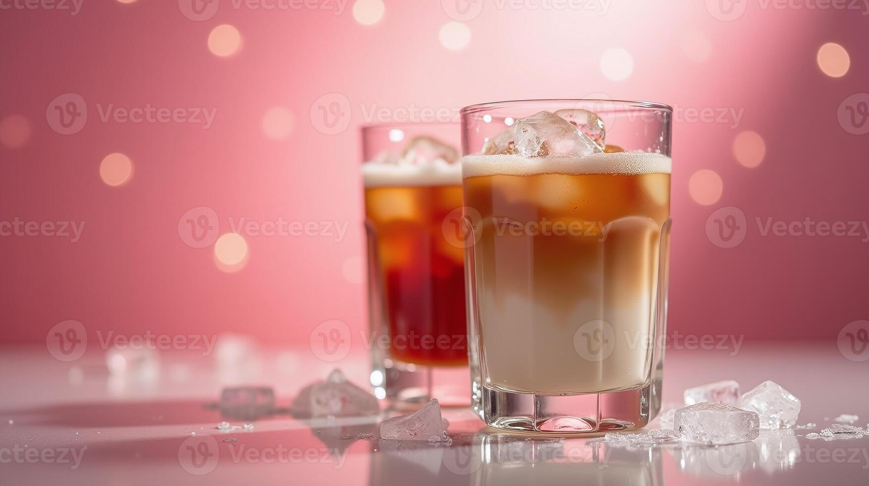 Two refreshing beverages adorn a pink-hued backdrop. photo