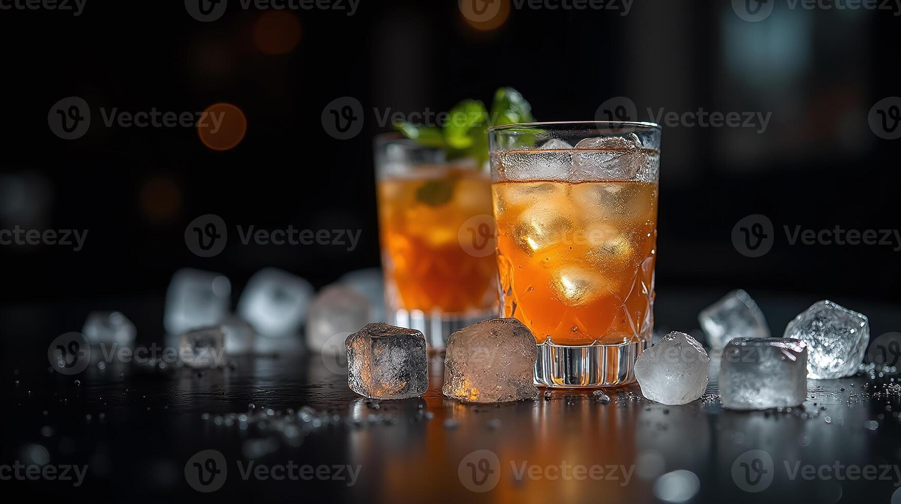 Two glasses filled with a refreshing beverage, ice cubes, and a dark, inviting background. photo