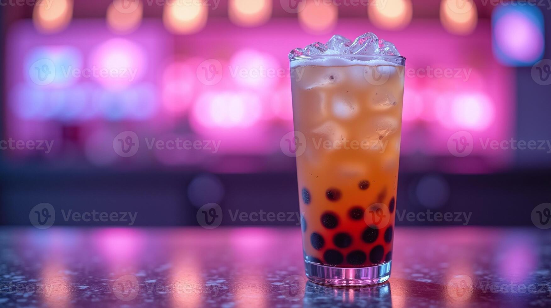 Ample libations of chilled, ice-capped beverage on a vibrant, neon-lit bar. photo