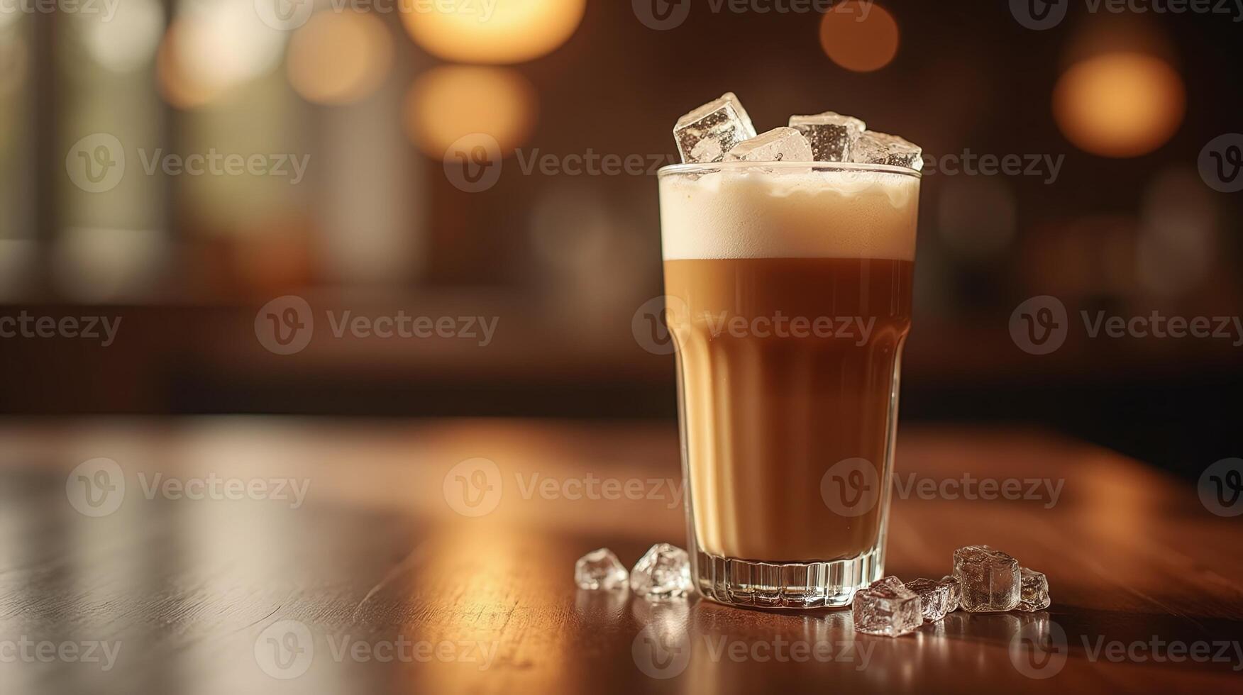 Iced coffee beverage in a tall glass, garnished with ice cubes. photo