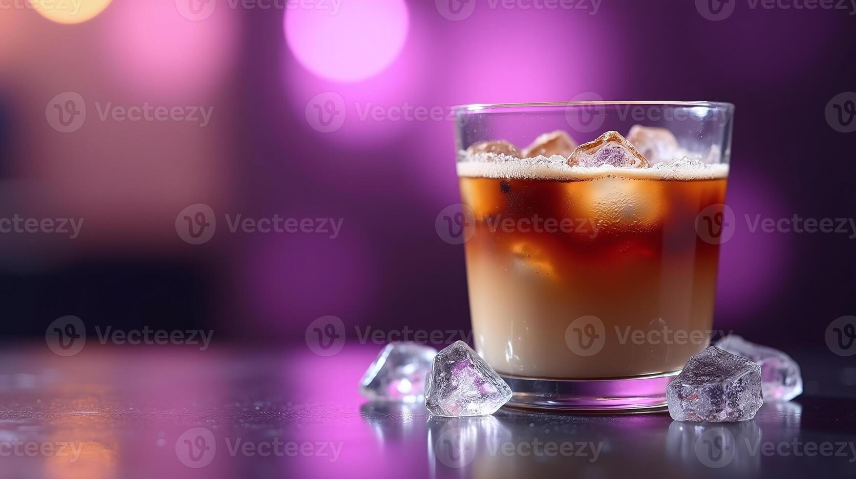 Cold beverage with ice cubes on a table. photo