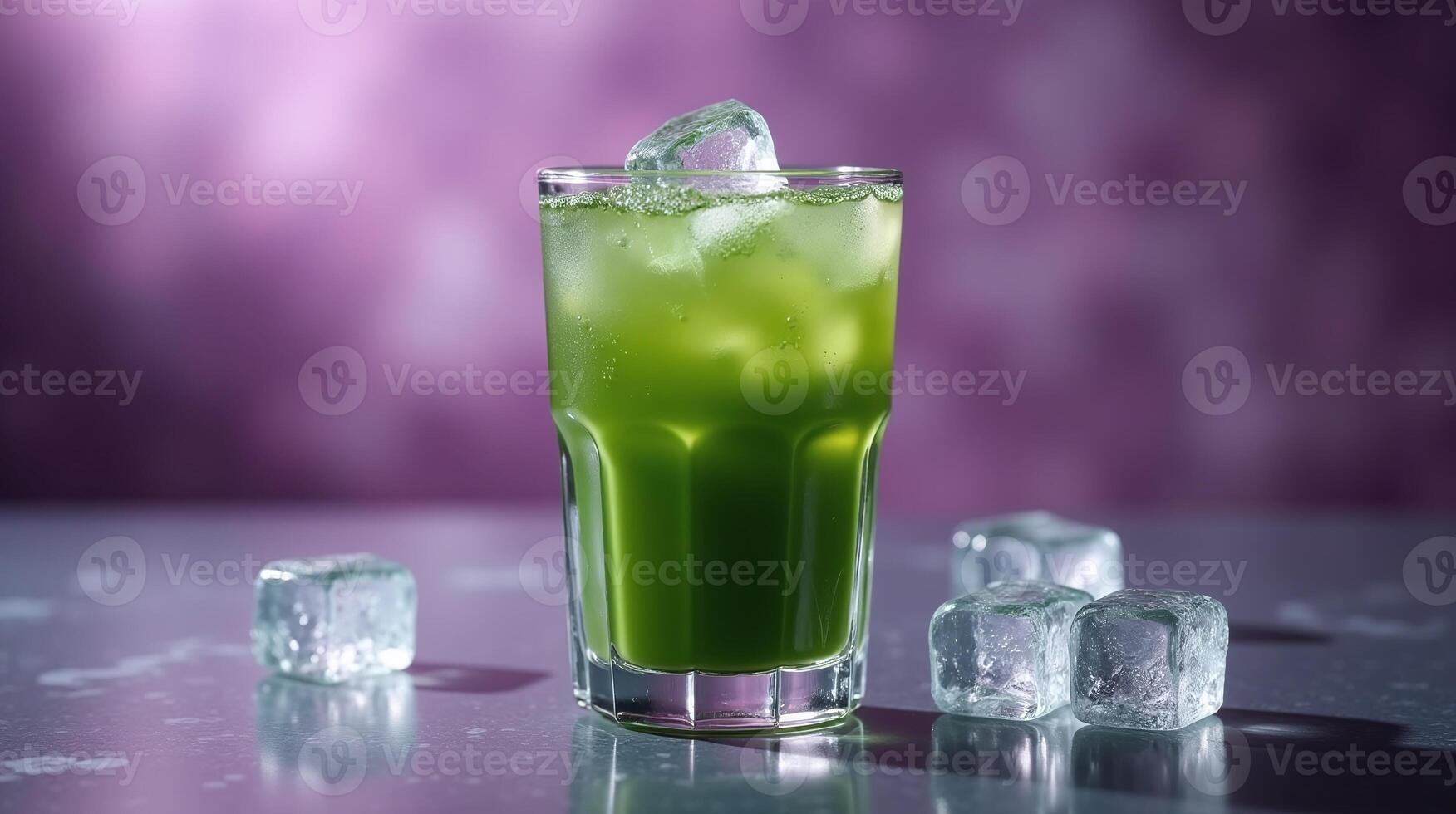 Vibrant green beverage with ice cubes on a reflective surface. photo