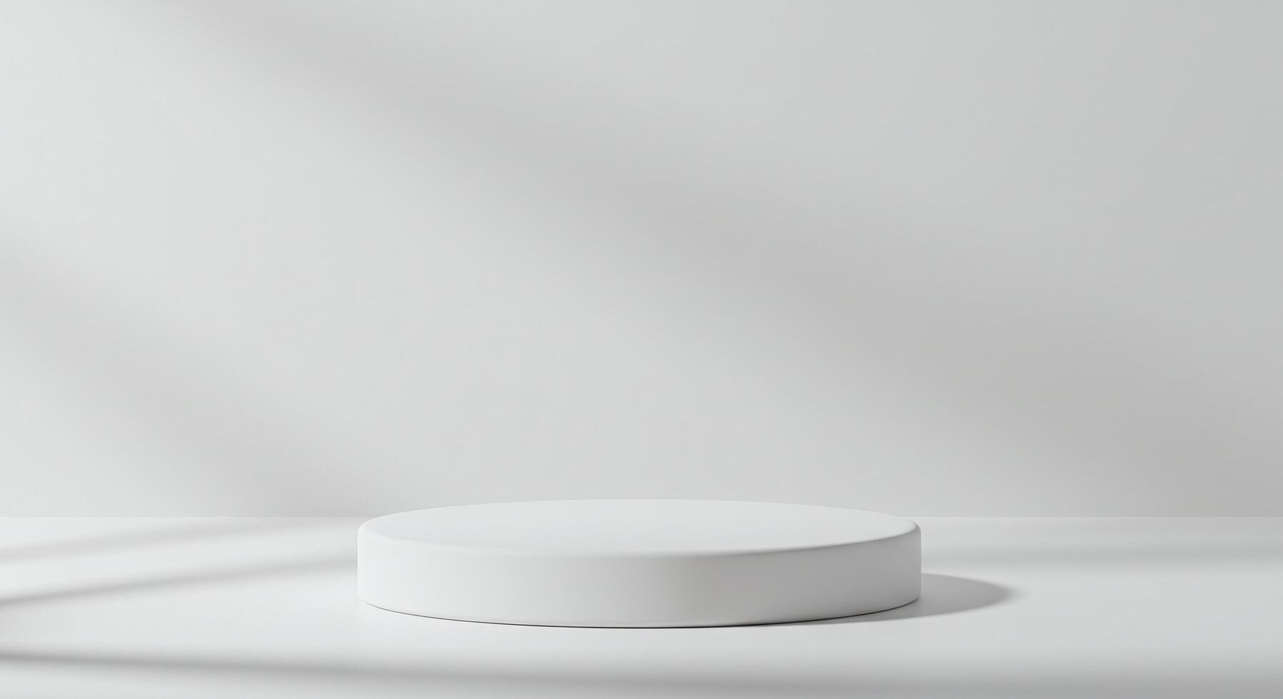 Minimalist white podium for product display with natural light shadows photo