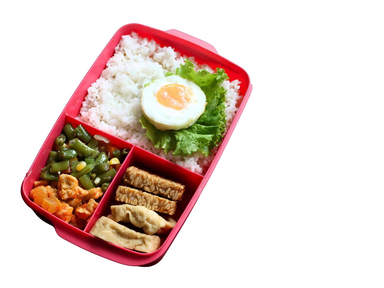 Balanced nutritious food consisting rice, egg, tofu, tempeh, and vegetables, served on lunch box, suitable for students health photo