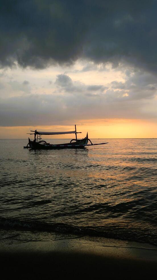 Panoramic sunset view at a luxury beach in the tropics, Serene sunset over calm ocean, vertical photo