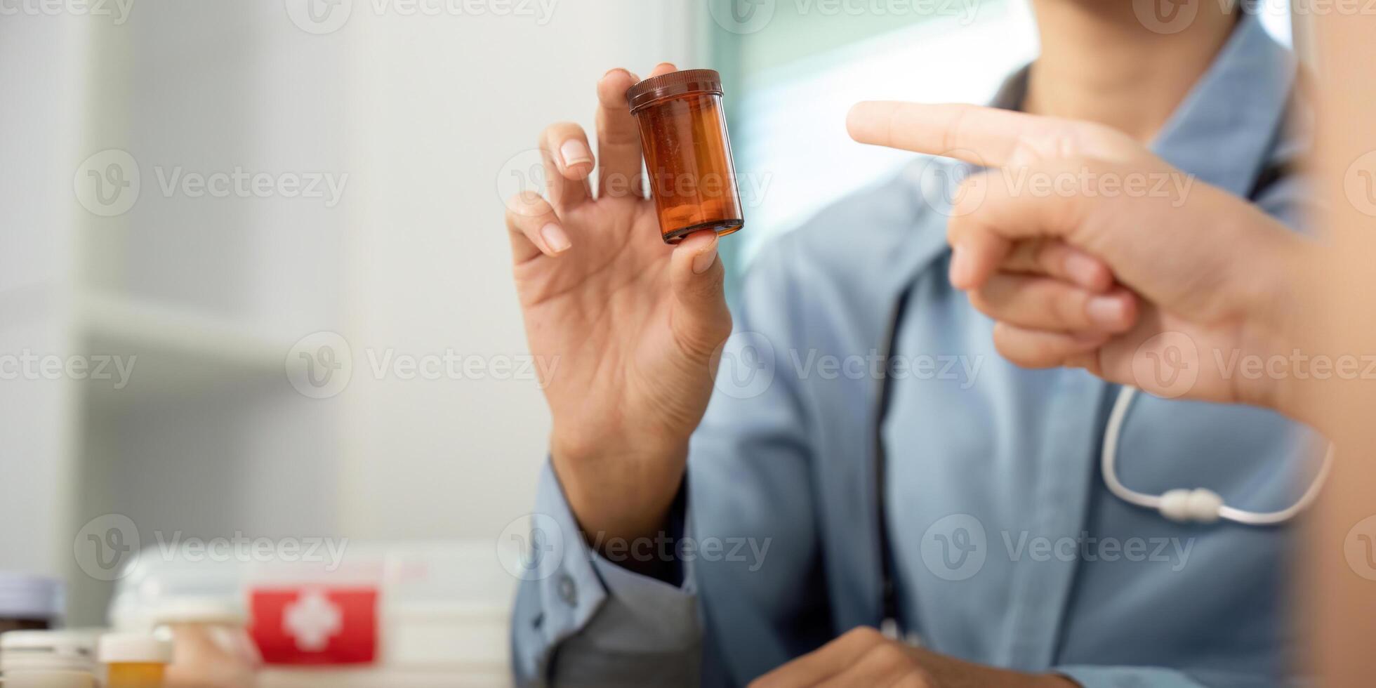 Patient Consultation on Medication. Doctor discussing prescription with a patient in a healthcare setting. photo