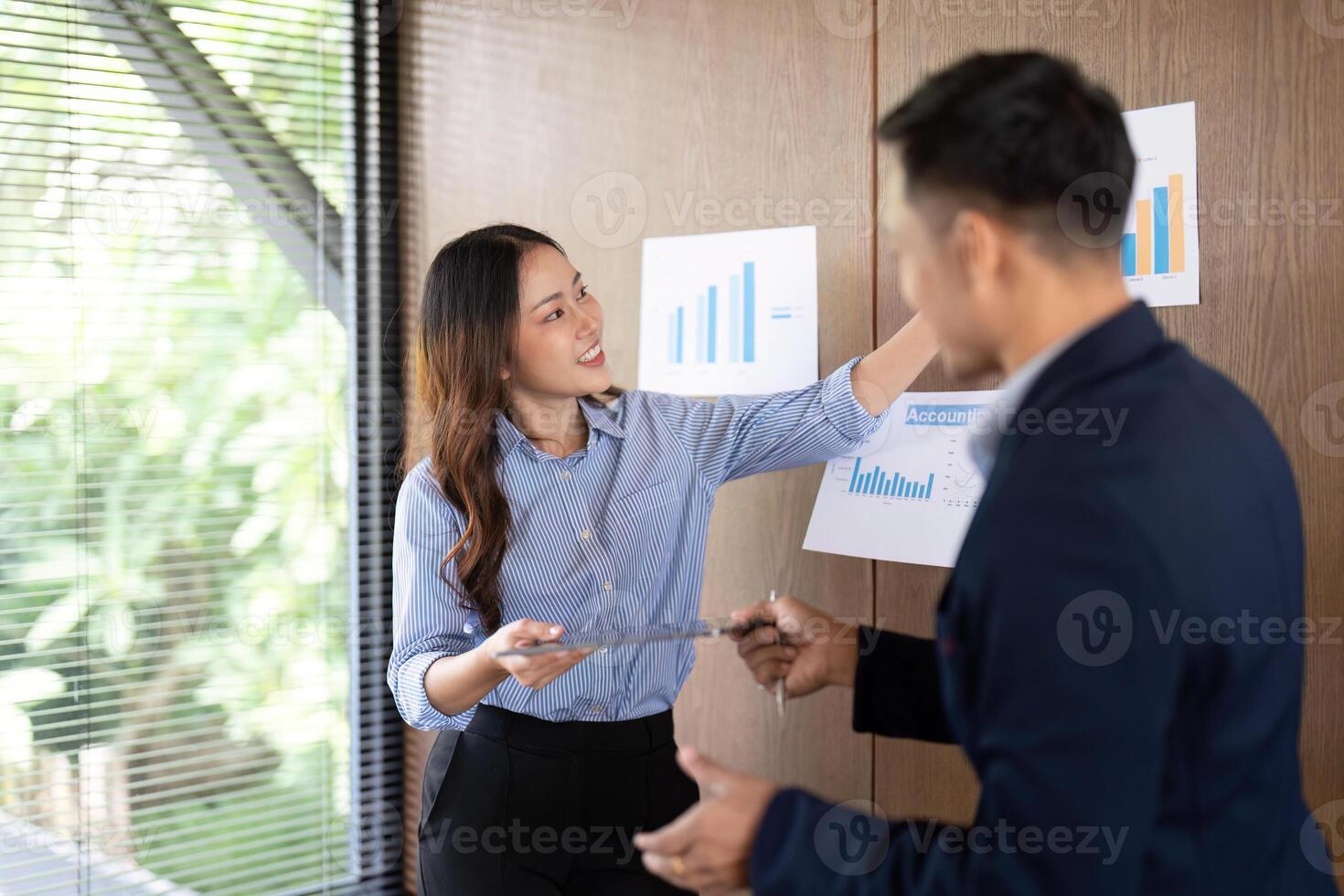 Presenting Data Insights. Professional explaining project results to colleague. photo
