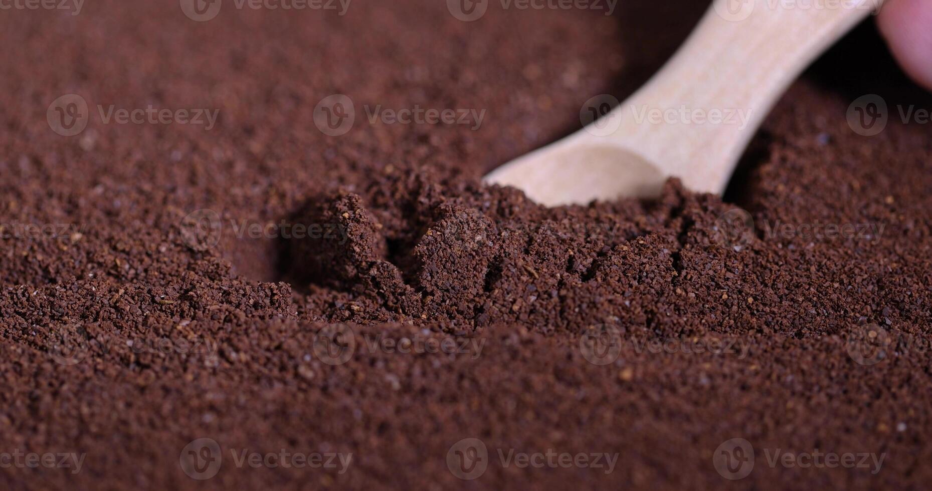 a large number of ground coffee beans for quick preparation of a drink photo