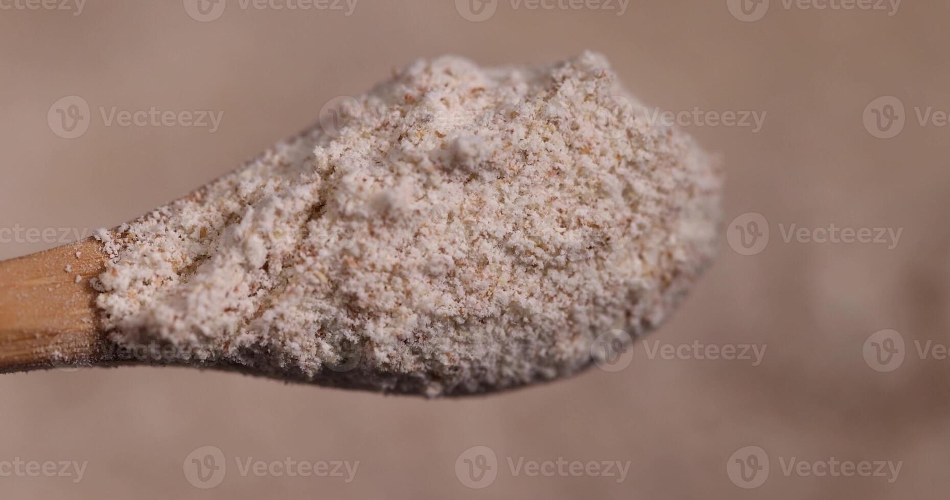 fresh wheat flour close-up, flour for making bread with bran photo