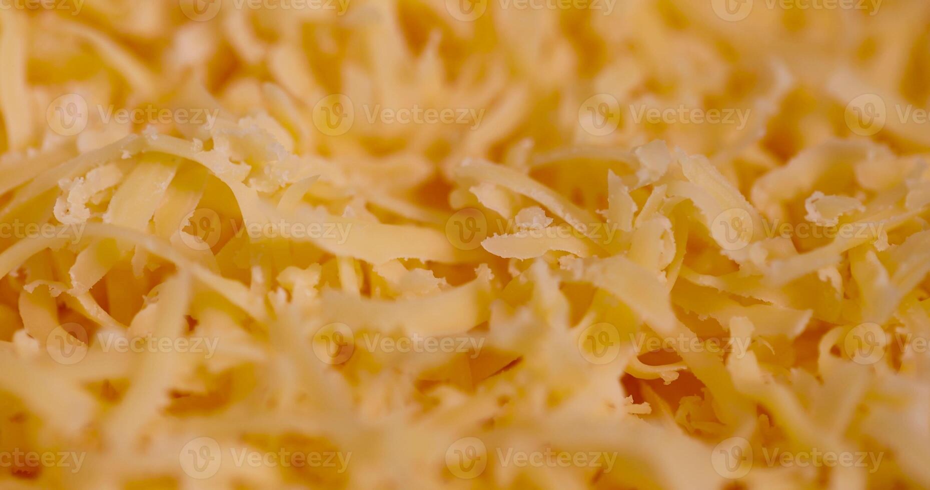 grated cheese preparation for adding to dishes photo