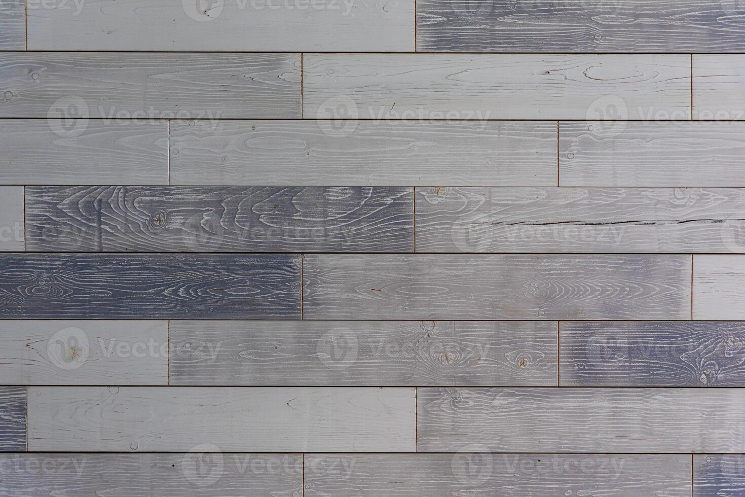 Horizontal gray wood planks with natural grain patterns, ideal for rustic or modern interior backgrounds and textures. photo