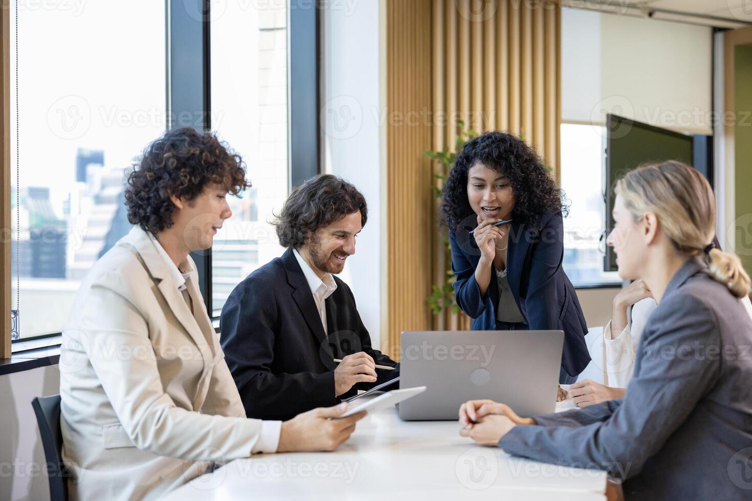 African woman sale manager is showing annual report chart to colleagues in the executive meeting for next year plan with market share increase for global business and investment concept photo