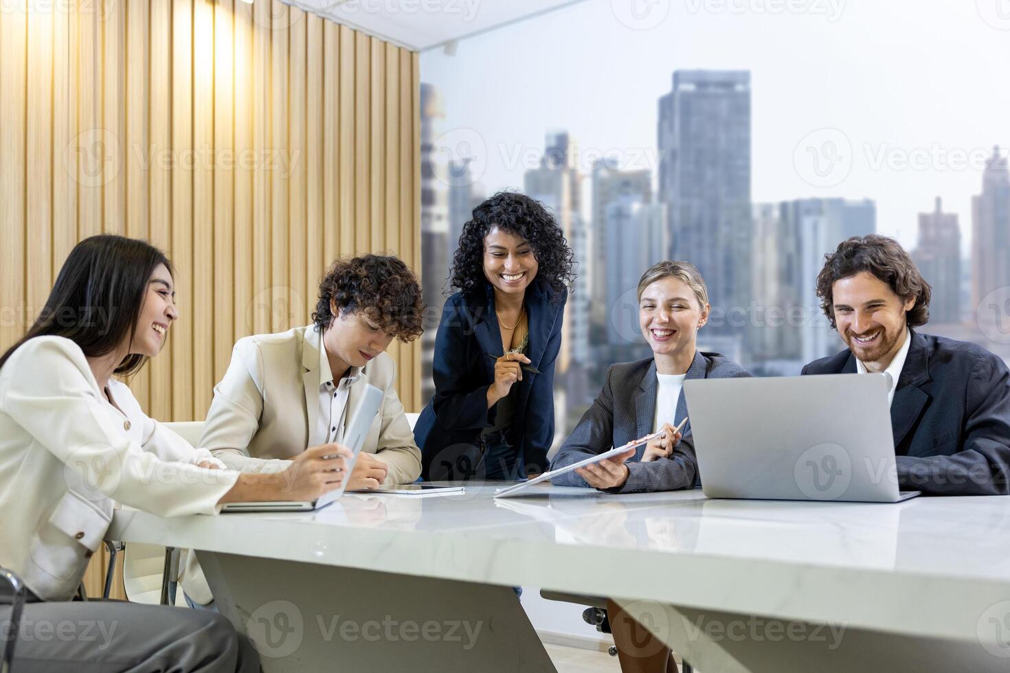African woman sale manager is showing her annual report chart to her colleagues in the executive meeting for next year plan with market share increase for global business and investment photo